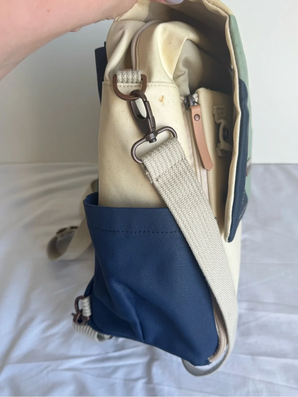 Petunia Pickle Bottom Boxy Backpack Diaper Bag in a geometric cream, navy, teal